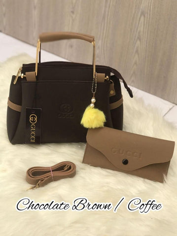 Most Demandable Gucci 2 Piece set. Featuring a long wallet and cute pom pom keychains