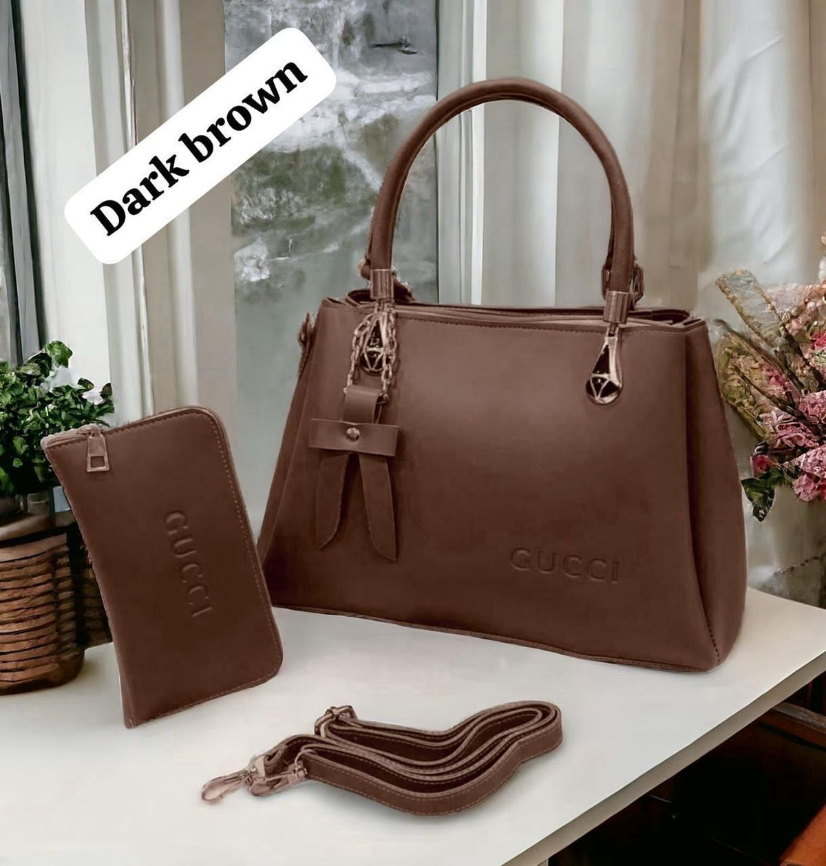 Gucci two-piece set features a stylish zipper wallet