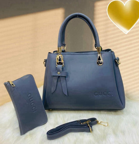 Gucci two-piece set features a stylish zipper wallet